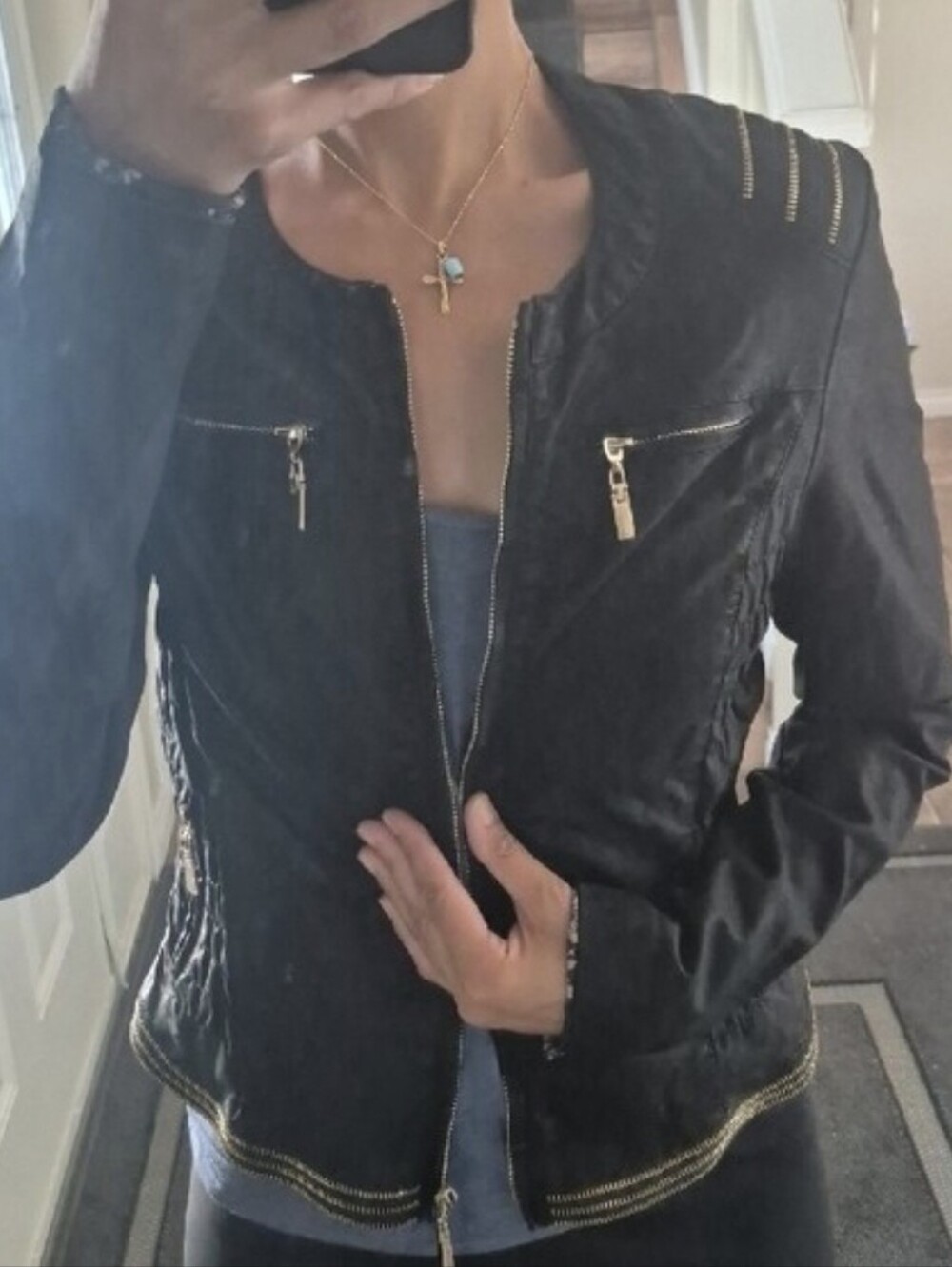 Black Jacket with Gold Zipper Accents